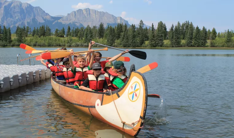Children in a canoe in the Bow Valley